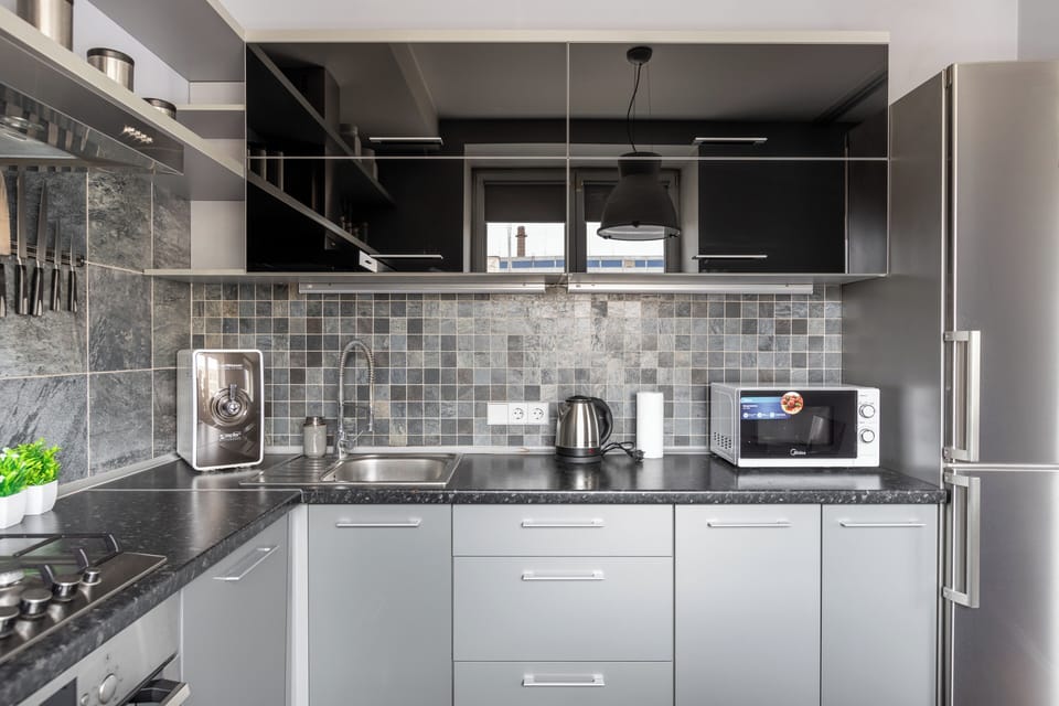 Classic Studio, City View | Private kitchen | Full-size fridge, microwave, oven, stovetop