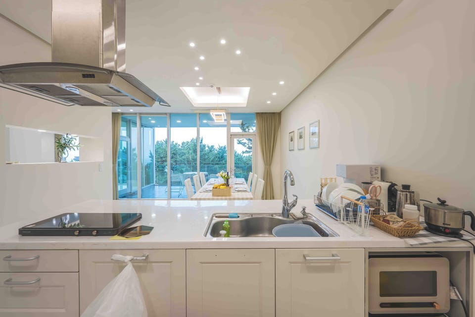 Villa, Ocean View, Beachside | Private kitchen | Full-size fridge, microwave, oven, stovetop