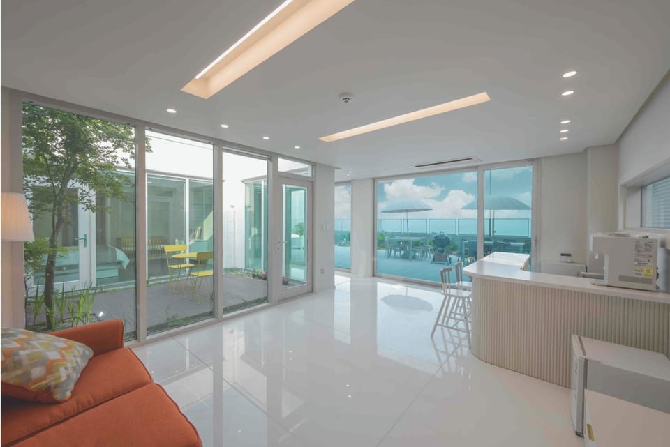Villa, Ocean View, Beachside | Living area | 100-inch Smart TV with cable channels, Netflix, streaming services