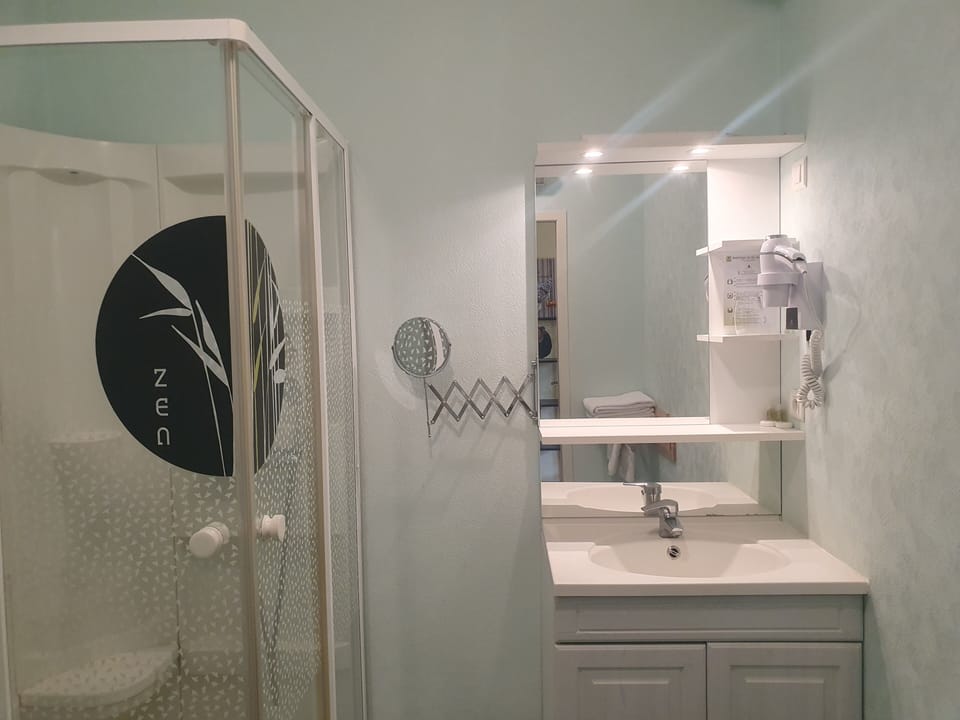 Shower, free toiletries, hair dryer, towels