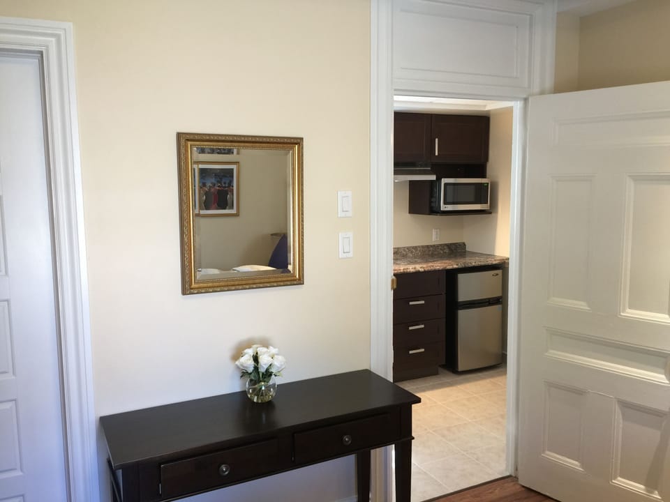 Deluxe Room, 1 Queen Bed, Ensuite + Kitchenette | Desk, iron/ironing board, free WiFi, bed sheets