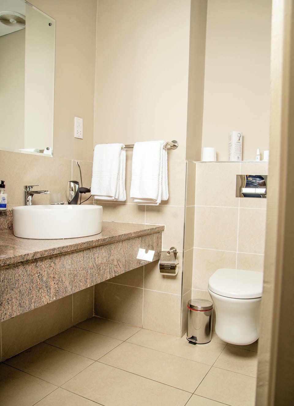 Hair dryer, towels, soap, shampoo
