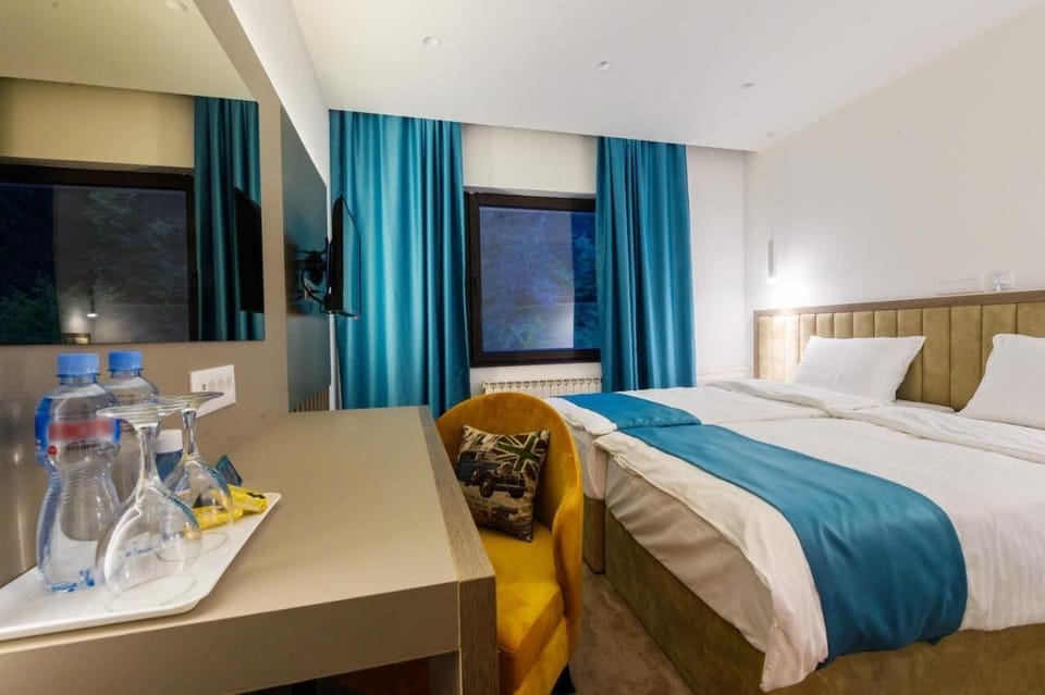Deluxe Double or Twin Room, Lake View | Desk, laptop workspace, soundproofing, free WiFi