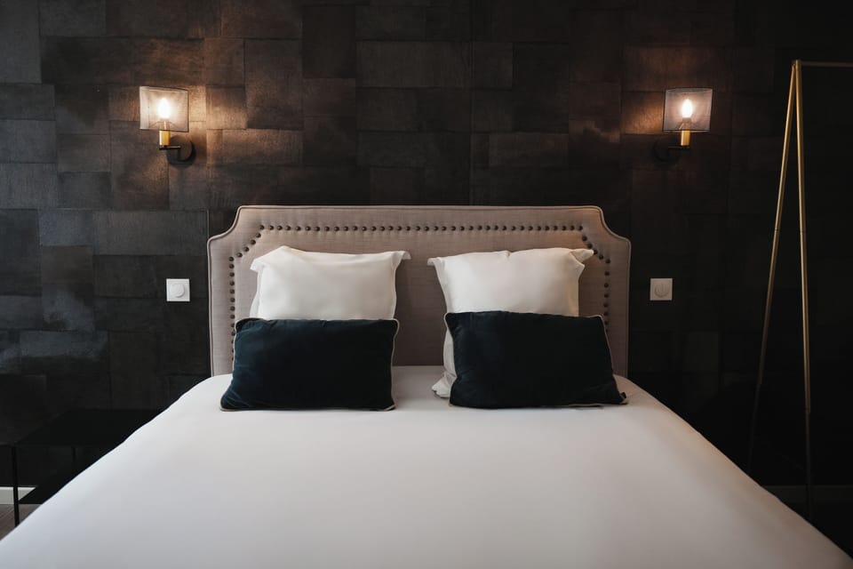 Premium bedding, desk, laptop workspace, soundproofing