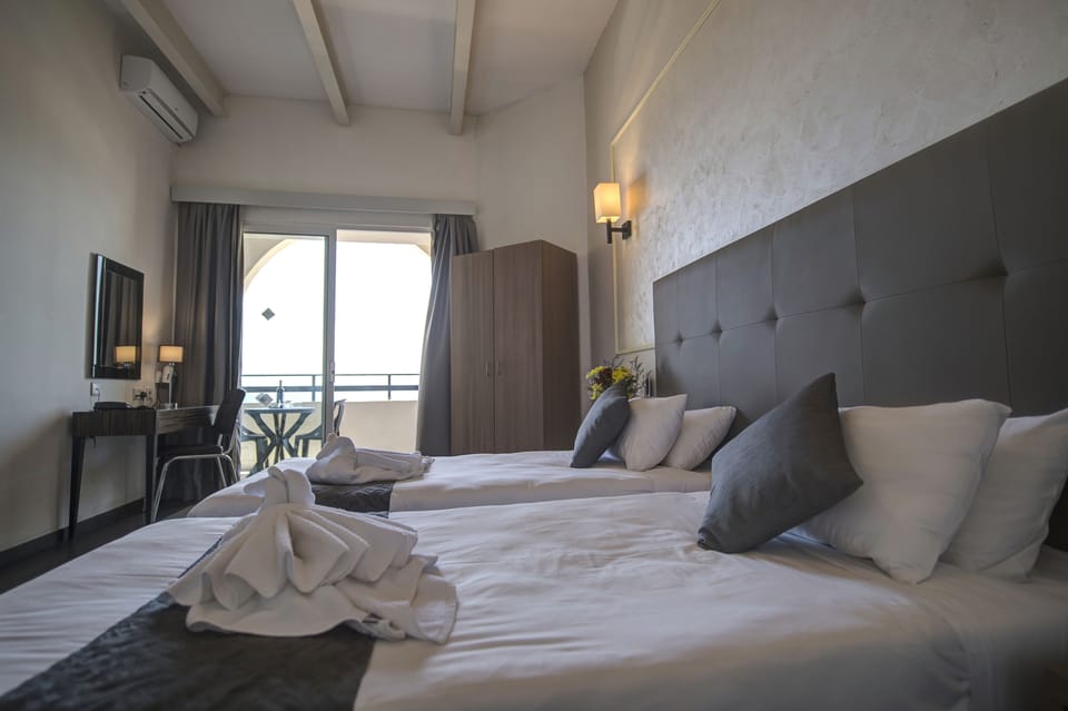 Desk, blackout drapes, iron/ironing board, free WiFi