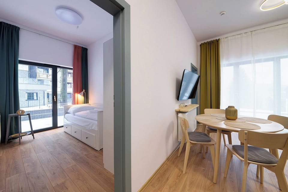Apartment, Balcony | Living area | 37-inch flat-screen TV with digital channels, TV