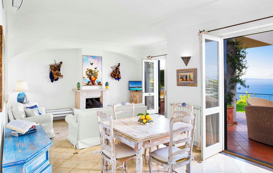 Villa, Patio, Sea View | Living area | 32-inch TV with satellite channels, stereo