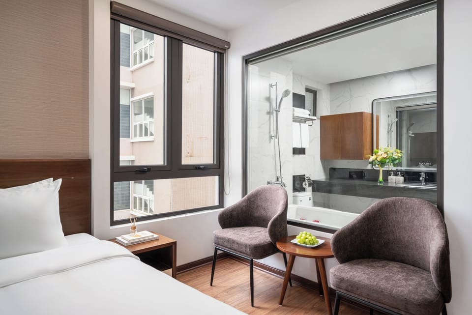 Deluxe Double Room, City View | In-room safe, desk, laptop workspace, iron/ironing board