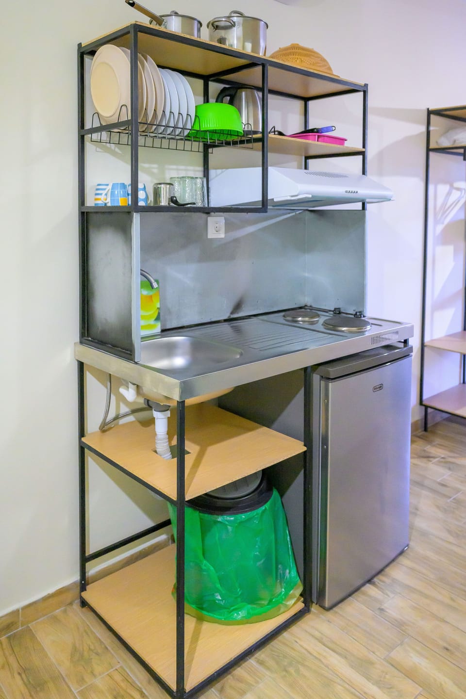 Fridge, stovetop, electric kettle, cookware/dishes/utensils