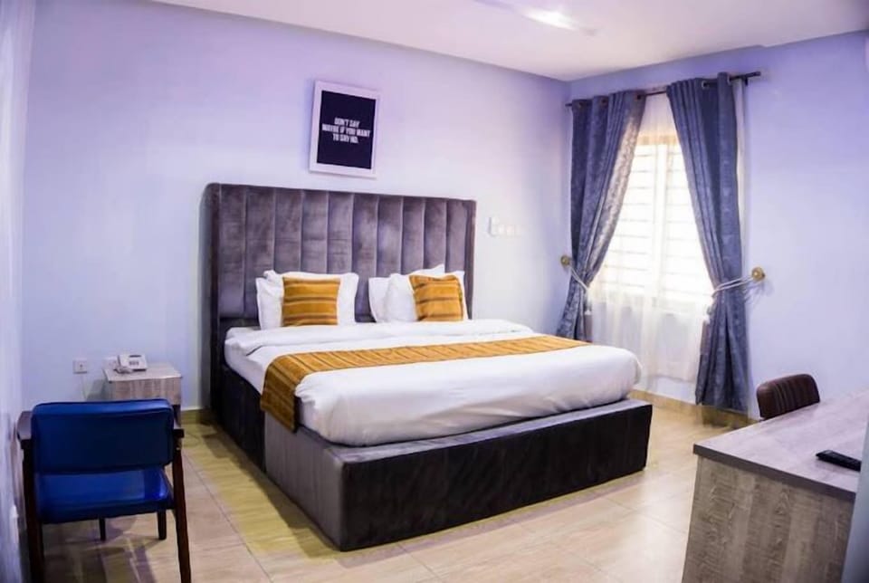 Comfort Room, Balcony, City View | Desk, laptop workspace, free WiFi