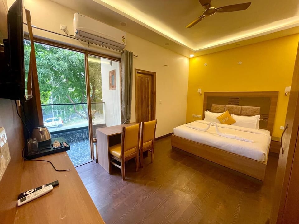 Deluxe Double Room, City View | In-room safe, blackout drapes, soundproofing, iron/ironing board