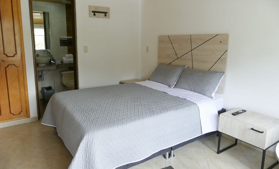 Double Room, City View | Desk, laptop workspace, iron/ironing board, free WiFi