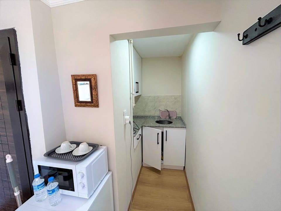 Panoramic Loft | Private kitchenette | Mini-fridge, microwave, electric kettle, cookware/dishes/utensils