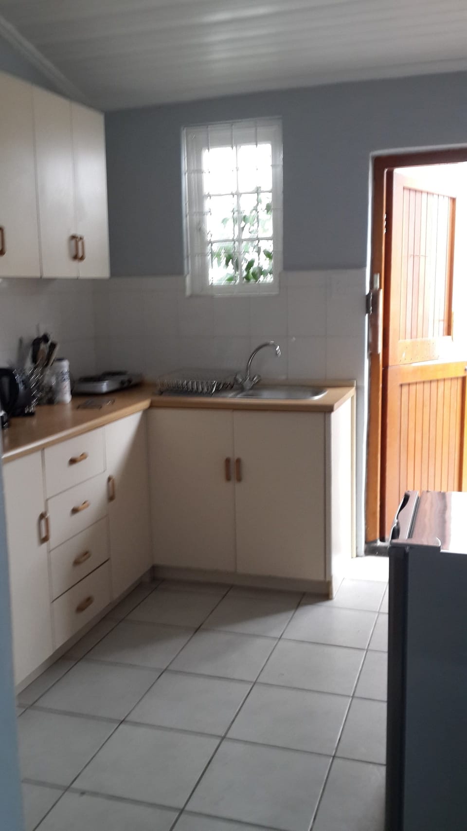 The Corner House - Self Catering | Minibar, desk, laptop workspace, iron/ironing board