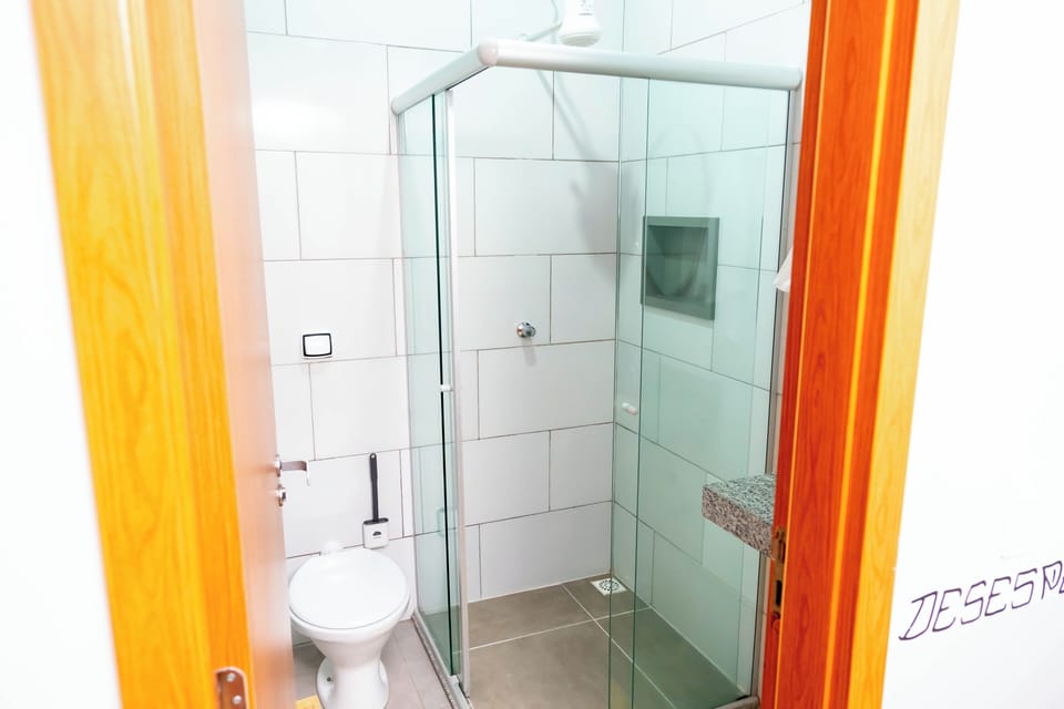 Shower, towels, soap, toilet paper