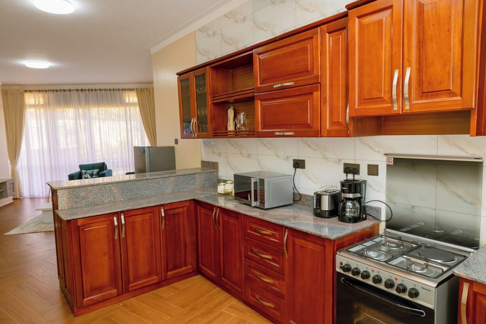 Economy Apartment, Hill View | Private kitchen | Fridge, microwave, oven, stovetop