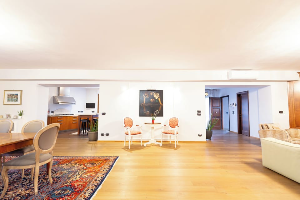 Luxury Condo | Living room | Flat-screen TV, fireplace, offices