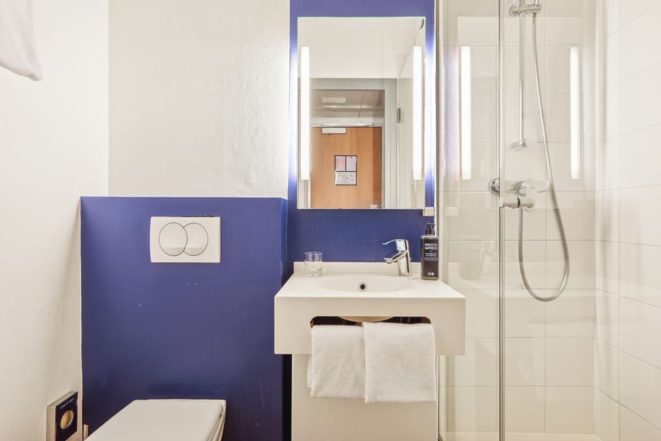 Eco-friendly toiletries, hair dryer, towels, soap