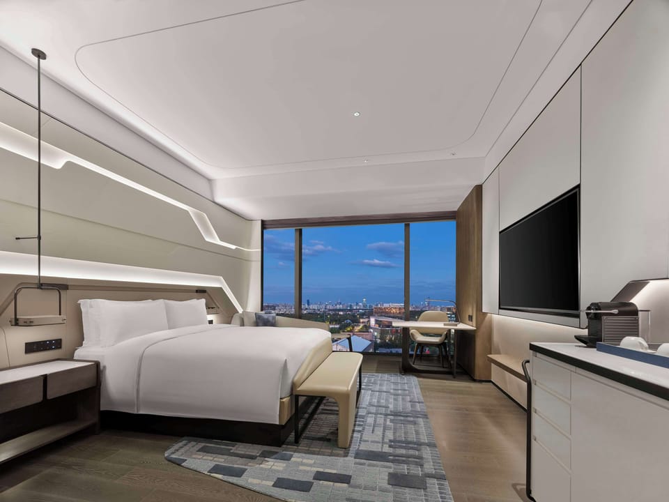 Down comforters, minibar, in-room safe, desk