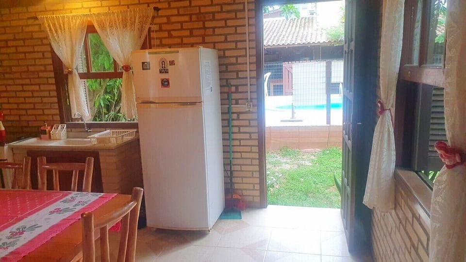 Family House, Balcony, Courtyard View | Private kitchen | Fridge, microwave, cookware/dishes/utensils, dining tables