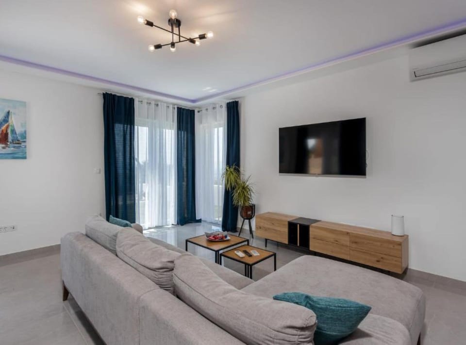 Villa (Four Bedroom Villa with Private Pool) | Living room | 32-inch flat-screen TV with cable channels