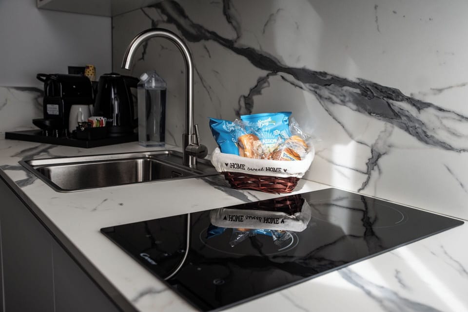 Family Room, Non Smoking, Kitchenette | Private kitchen | Espresso maker, coffee/tea maker, electric kettle