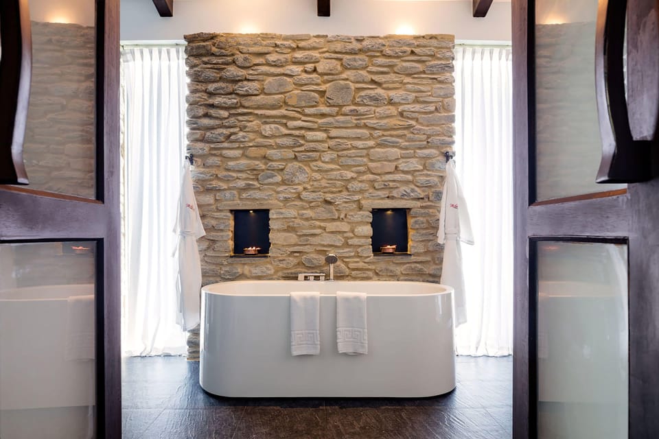 Separate tub and shower, free toiletries, hair dryer, bathrobes