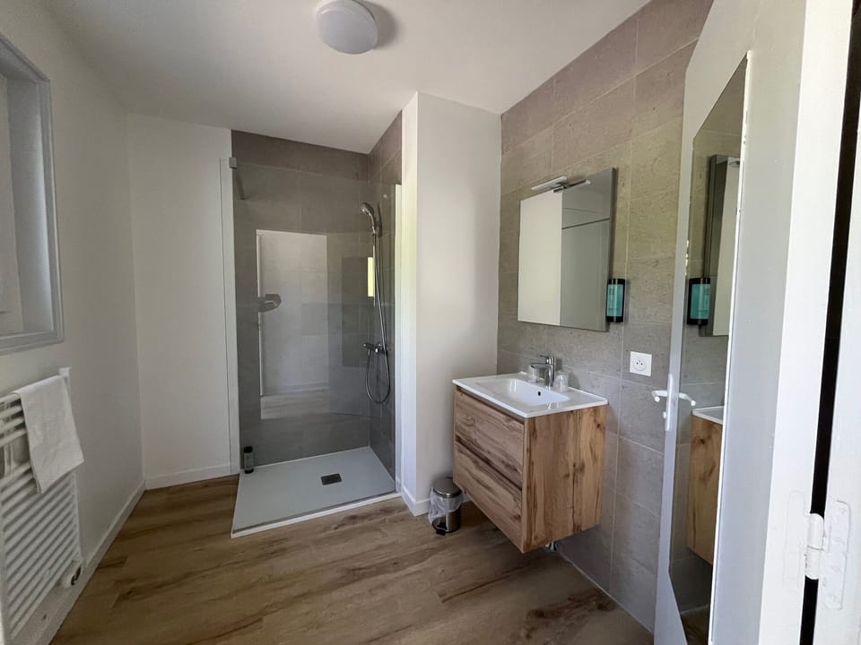 Superior Room | Bathroom | Hair dryer, towels, soap, shampoo