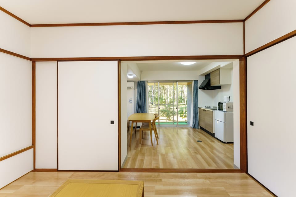 Comfort Suite, 2 Bedrooms, Garden View | Premium bedding, laptop workspace, blackout drapes, iron/ironing board