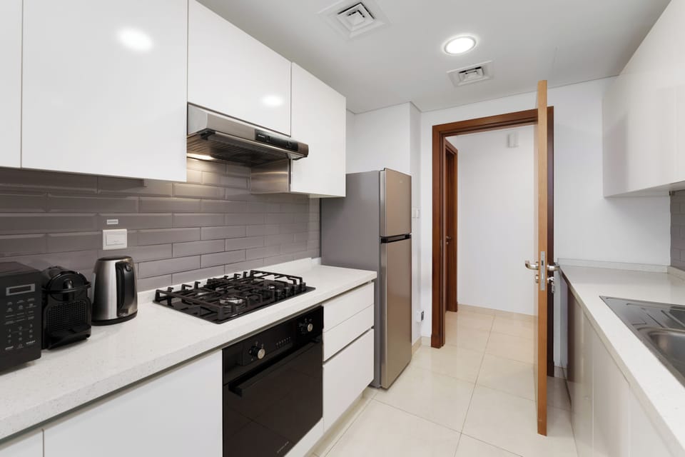 Deluxe Apartment, 1 King Bed with Sofa bed, Balcony | Private kitchen | Coffee/tea maker, electric kettle