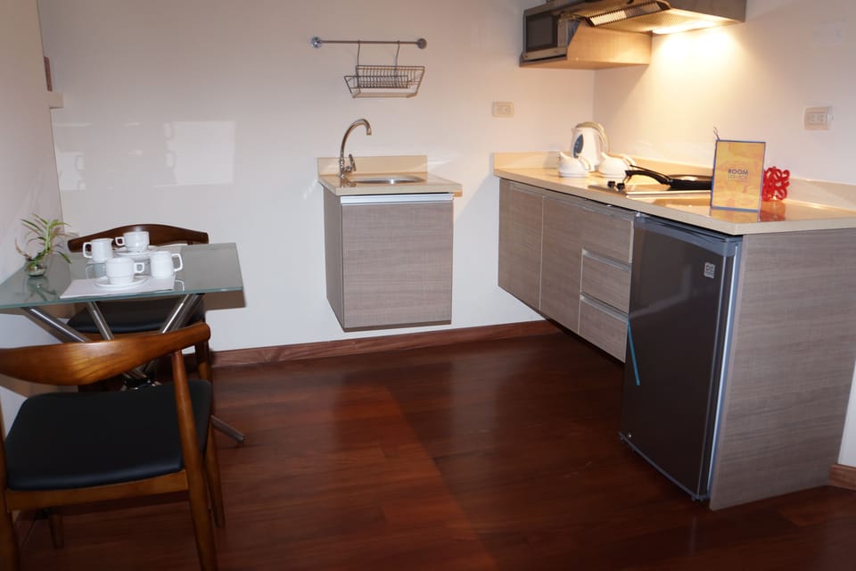 Coffee/tea maker, mini-fridge, microwave, electric kettle