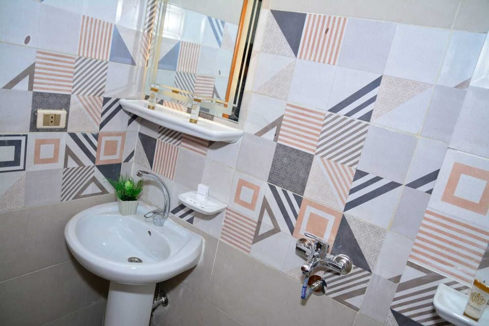 Single Room, Mountain View | Bathroom | Shower, free toiletries, hair dryer, slippers