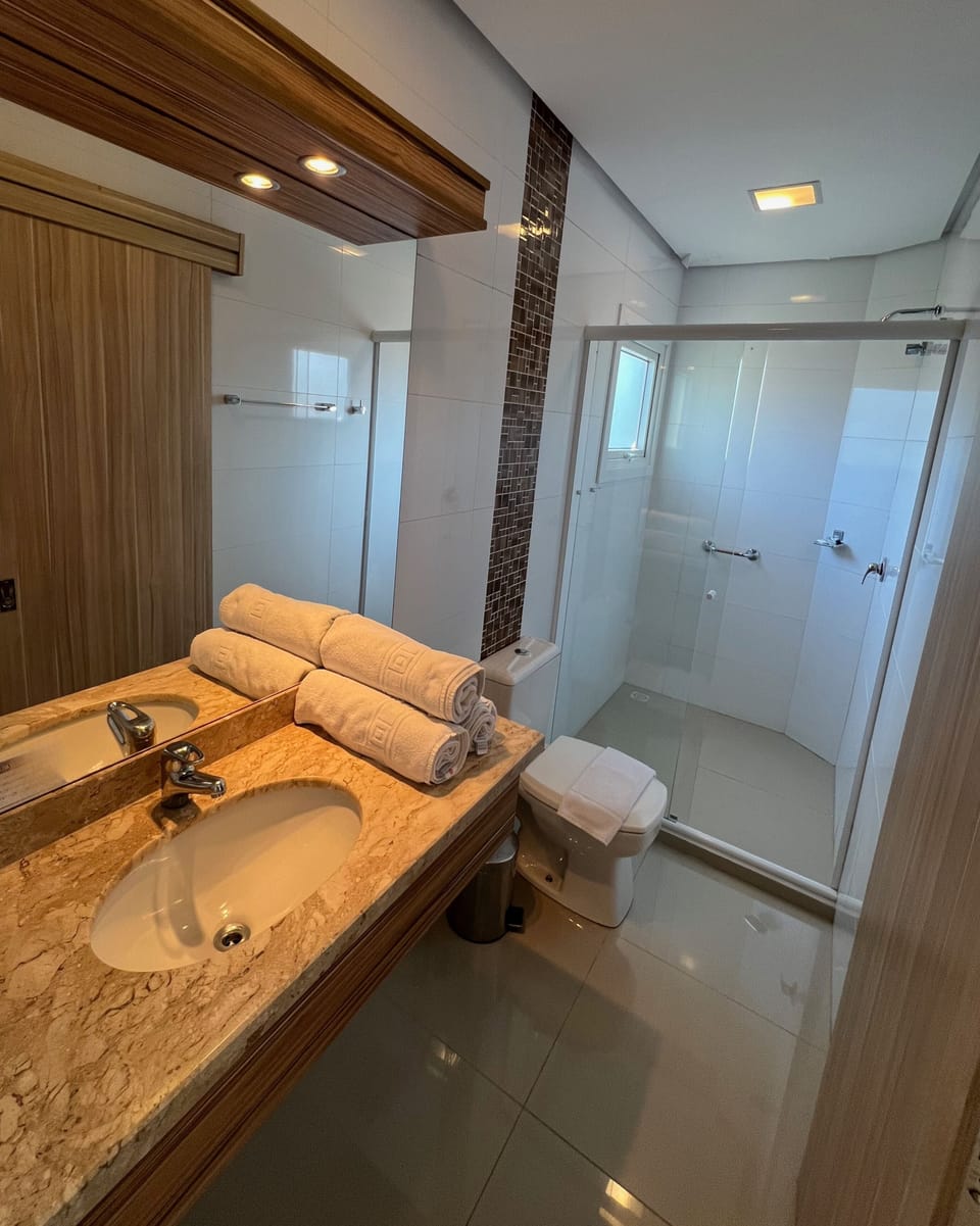 Deluxe Triple Room | Bathroom | Shower, soap, shampoo, toilet paper