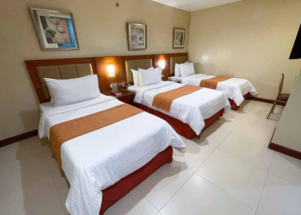 Triple Room | Premium bedding, in-room safe, desk, blackout drapes