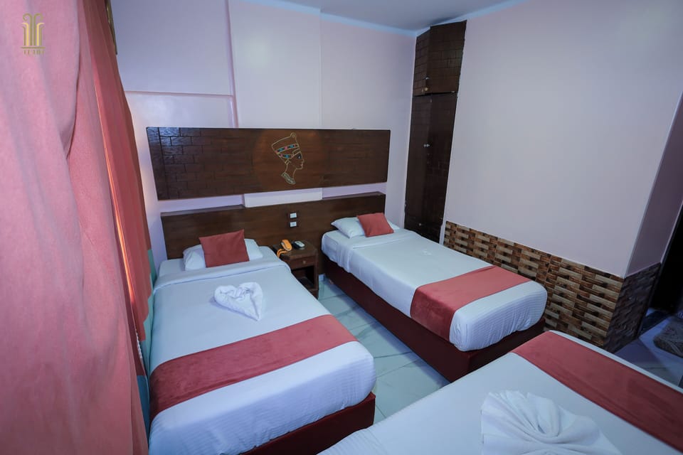Triple Room, City View | In-room safe, blackout drapes, soundproofing, free WiFi