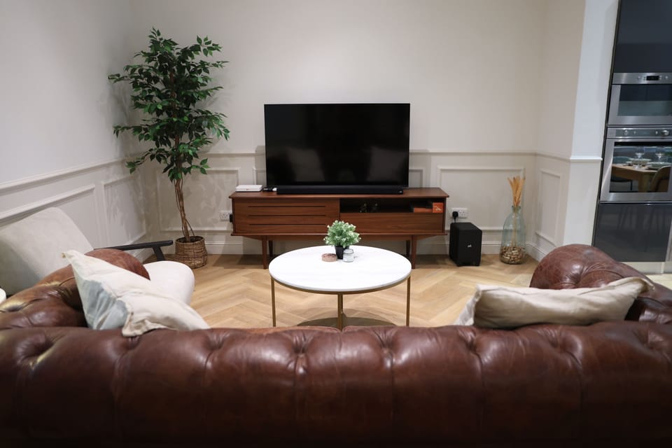 Deluxe Apartment, 2 Bedrooms, Kitchen | Living area | Flat-screen TV
