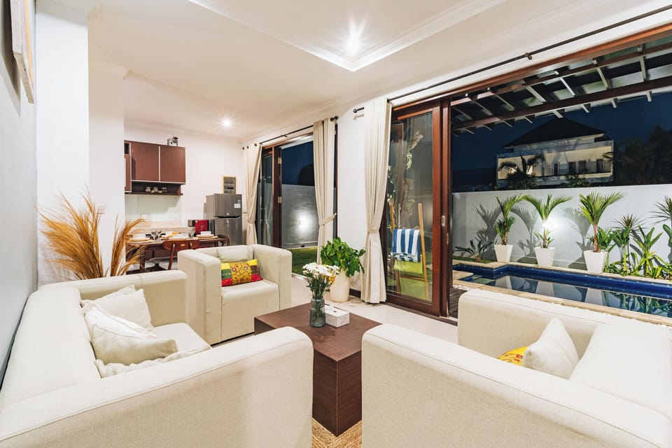 Deluxe Villa, Garden View | Living area | Flat-screen TV