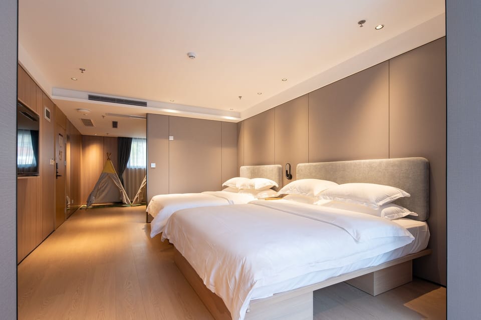 One-Bedroom Suite | Premium bedding, blackout drapes, soundproofing, free WiFi
