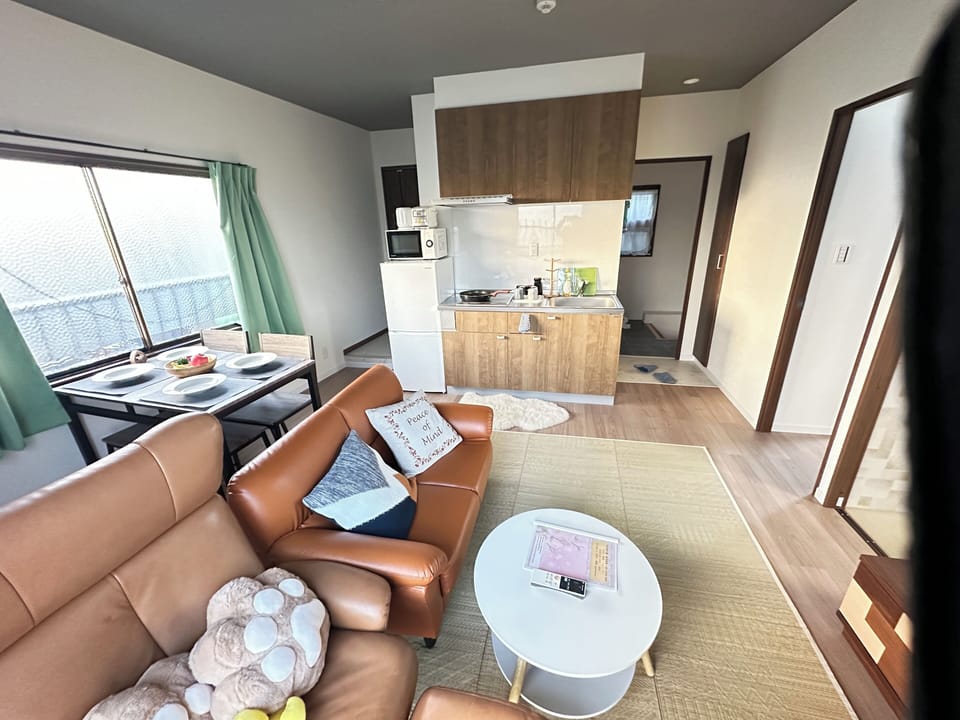 Economy Apartment, Non Smoking | Living area | Flat-screen TV