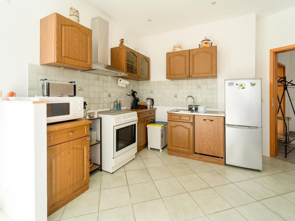 Apartment | Private kitchen | Electric kettle, highchair