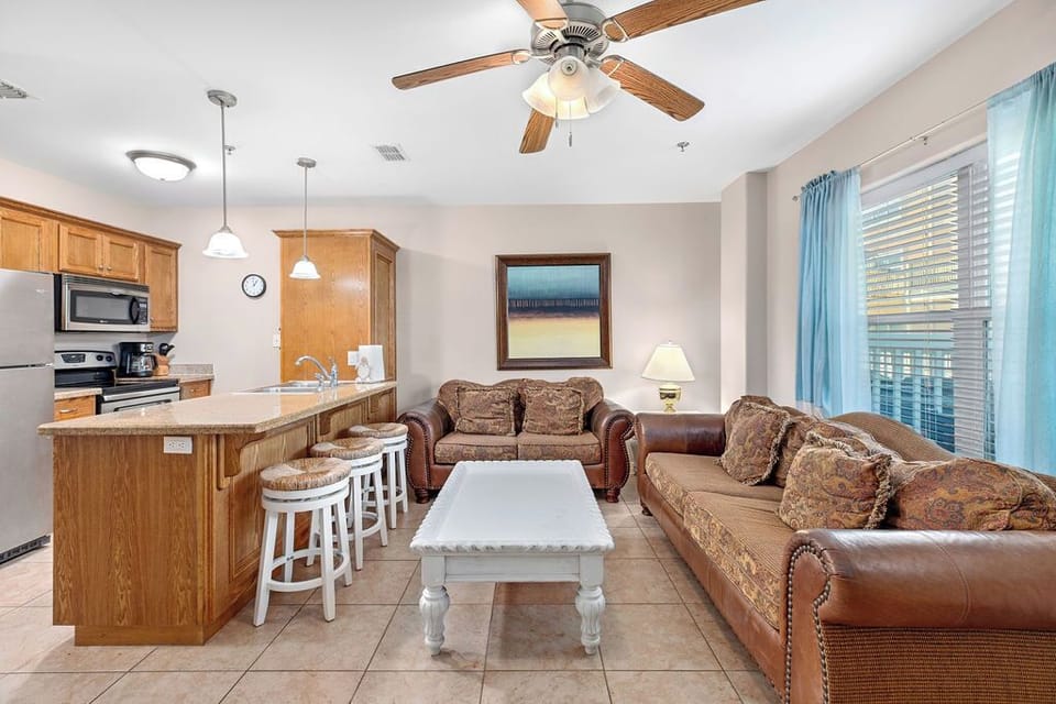 Condo, Balcony | Living area | 40-inch flat-screen TV with cable channels