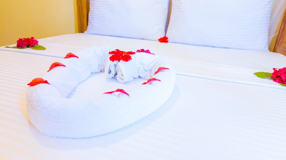 Basic Double Room, Ocean View | In-room safe, iron/ironing board, bed sheets