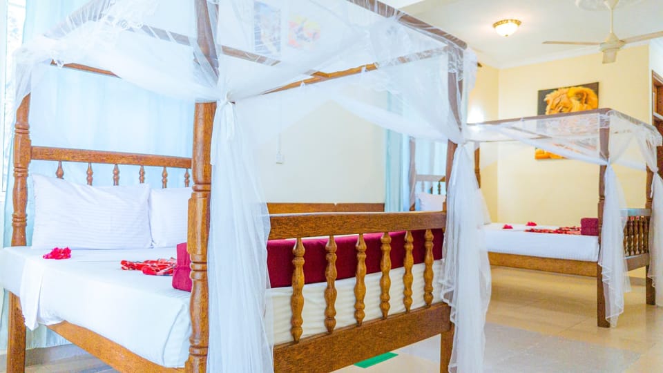 Family Suite, Balcony, Ocean View | In-room safe, iron/ironing board, bed sheets