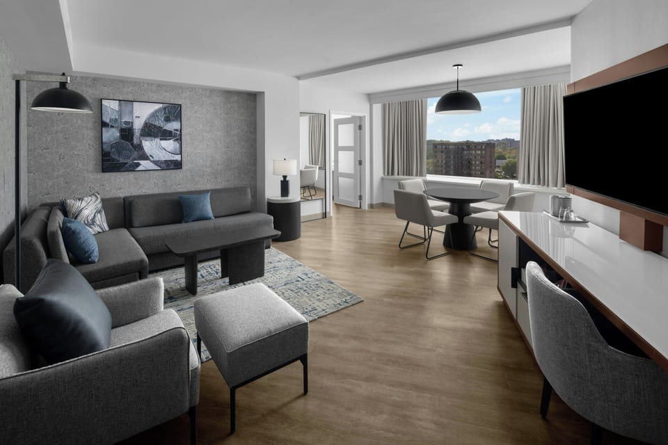 Suite, 1 Bedroom | Living room | 42-inch Smart TV with cable channels, TV, pay movies