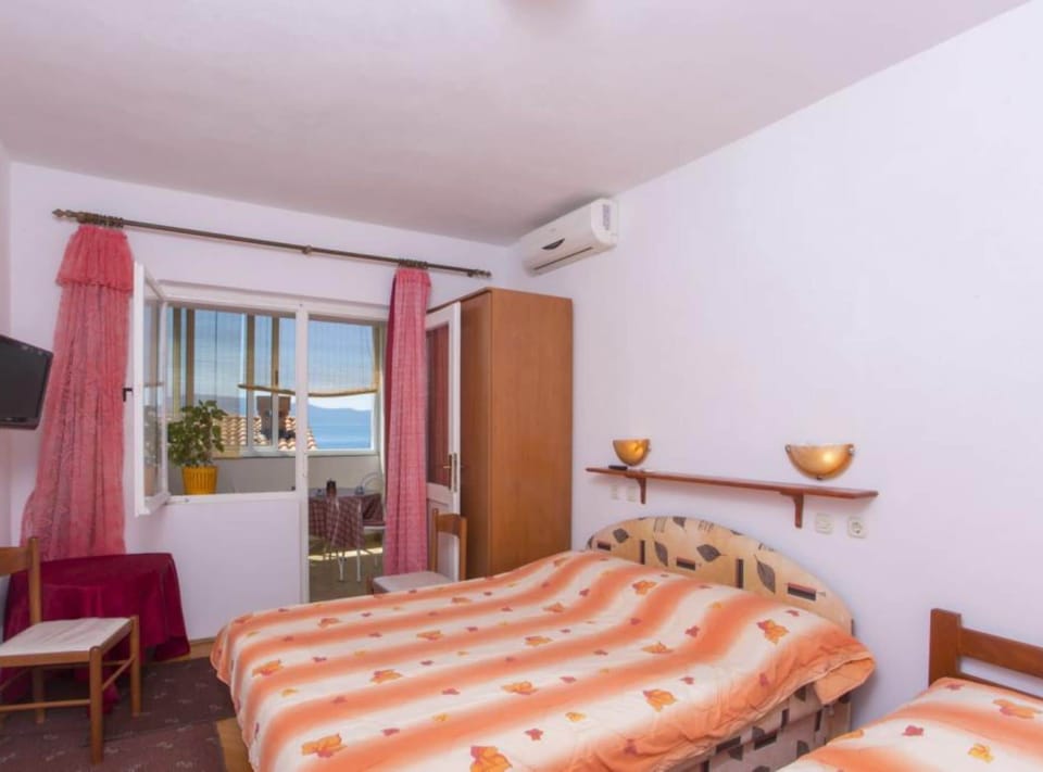 Apartment (Triple Room with Private Balcony (A3)) | 4 bedrooms, WiFi (free)