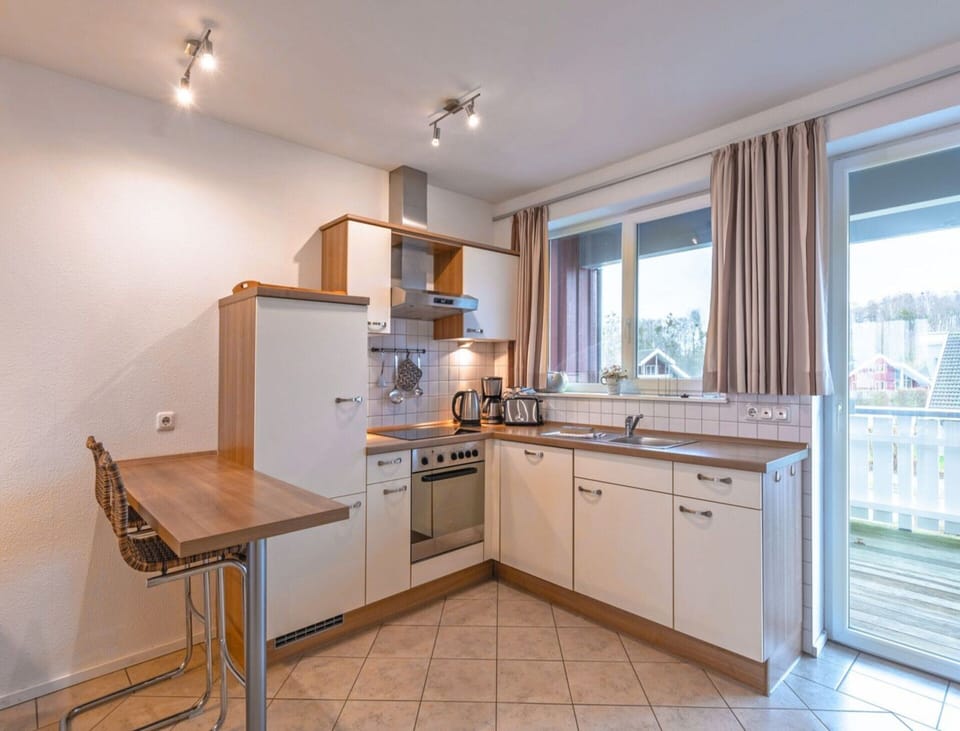 Apartment | Private kitchen | Electric kettle, toaster, highchair