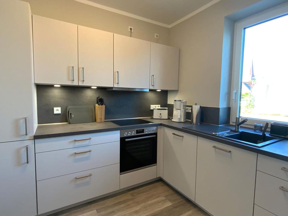 Apartment | Private kitchen | Electric kettle, toaster, highchair