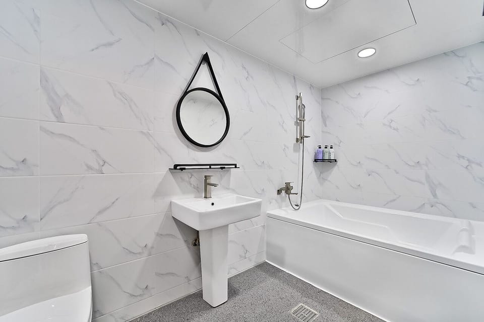 Twin Room | Bathroom | Hair dryer, slippers, towels, soap