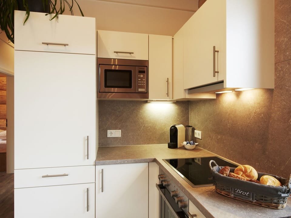 Chalet | Private kitchen | Stovetop, highchair