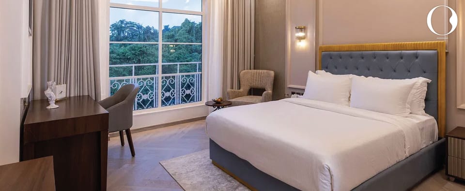 The Serene Room Garden View | Premium bedding, down comforters, memory foam beds, minibar